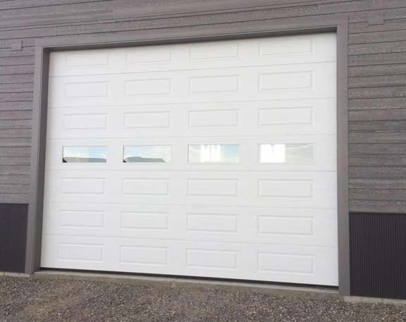 New construction. Steel Craft T-16 Thermocraft on commercial 3" hardware. Best door/hardware available.